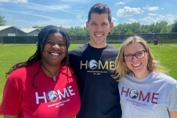Tammy Tyler and Kiya from the Alumni team are wearing new Homecoming shirts