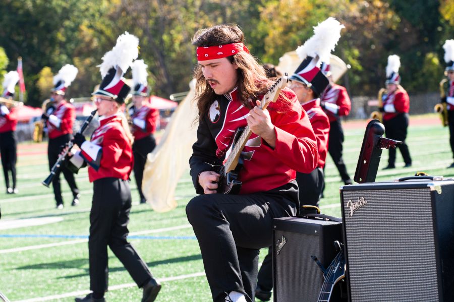 Guitarist performs in the Screamin' Eagles Marching Band's Metallica field show.