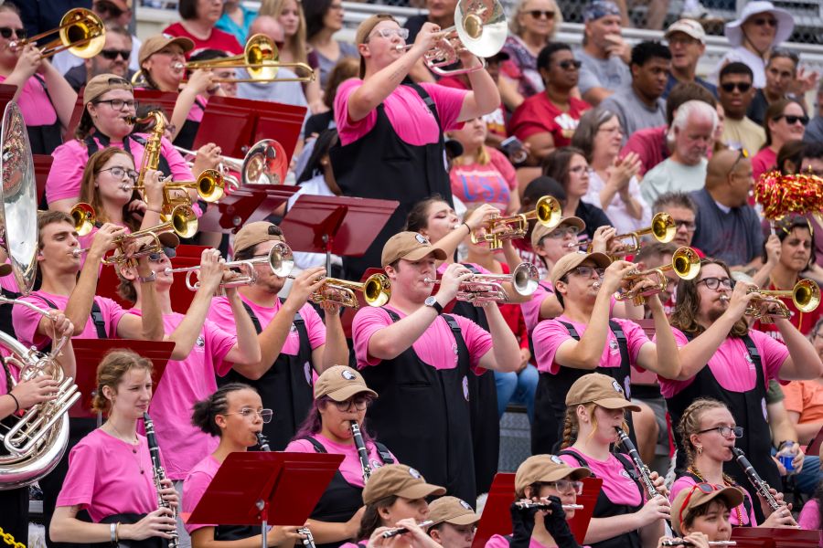 Screamin' Eagles Marching Band in pink t-shirts for their show, "American Divas."